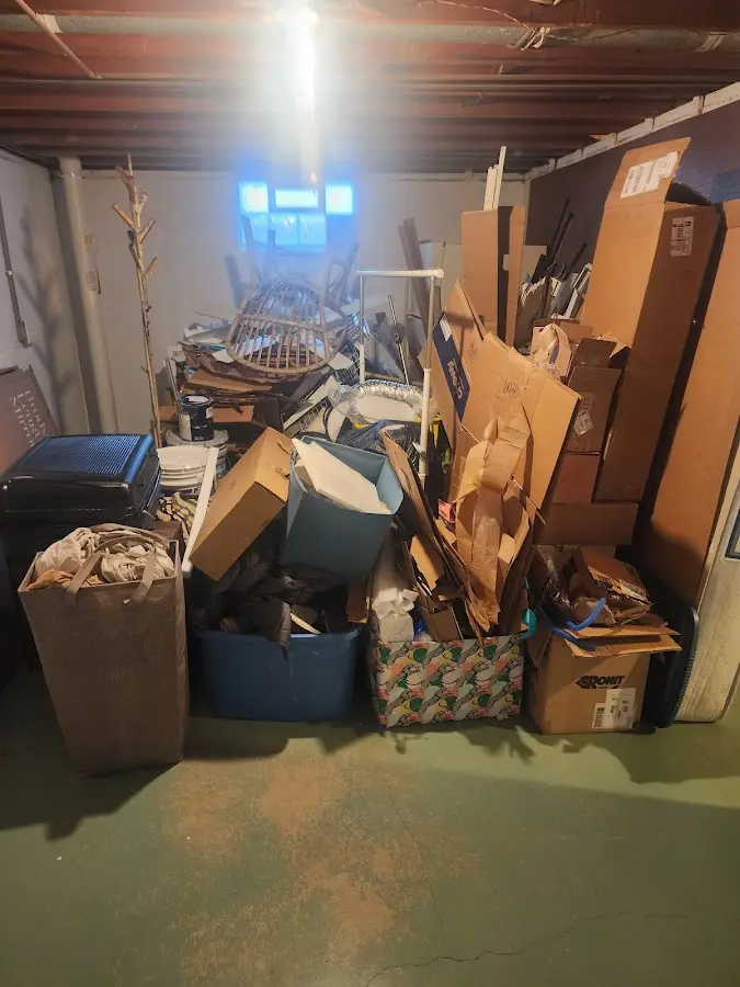 Roll-off dumpster container at job site for Yard Waste Dumpster Rental in Surfside Beach